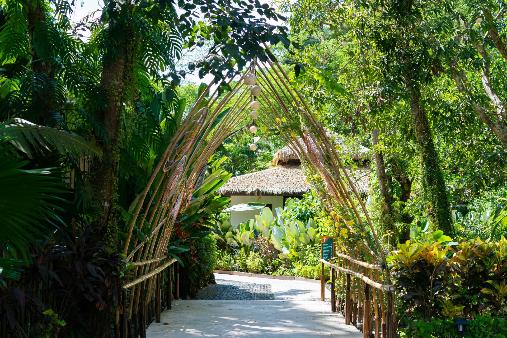 Bamboo arch garden path at Lihim Resorts El Nido